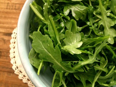 fresh organic raw vegan arugula green salad